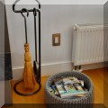 D03. Fireplace tools and magazine basket. 